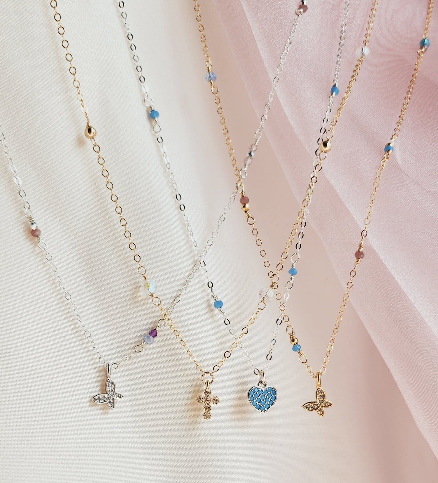 Handcrafted dainty everyday necklaces with asymmetrical hand-beaded 14k gold fill chains, perfect for whimsical, ethereal bridal or daily wear.