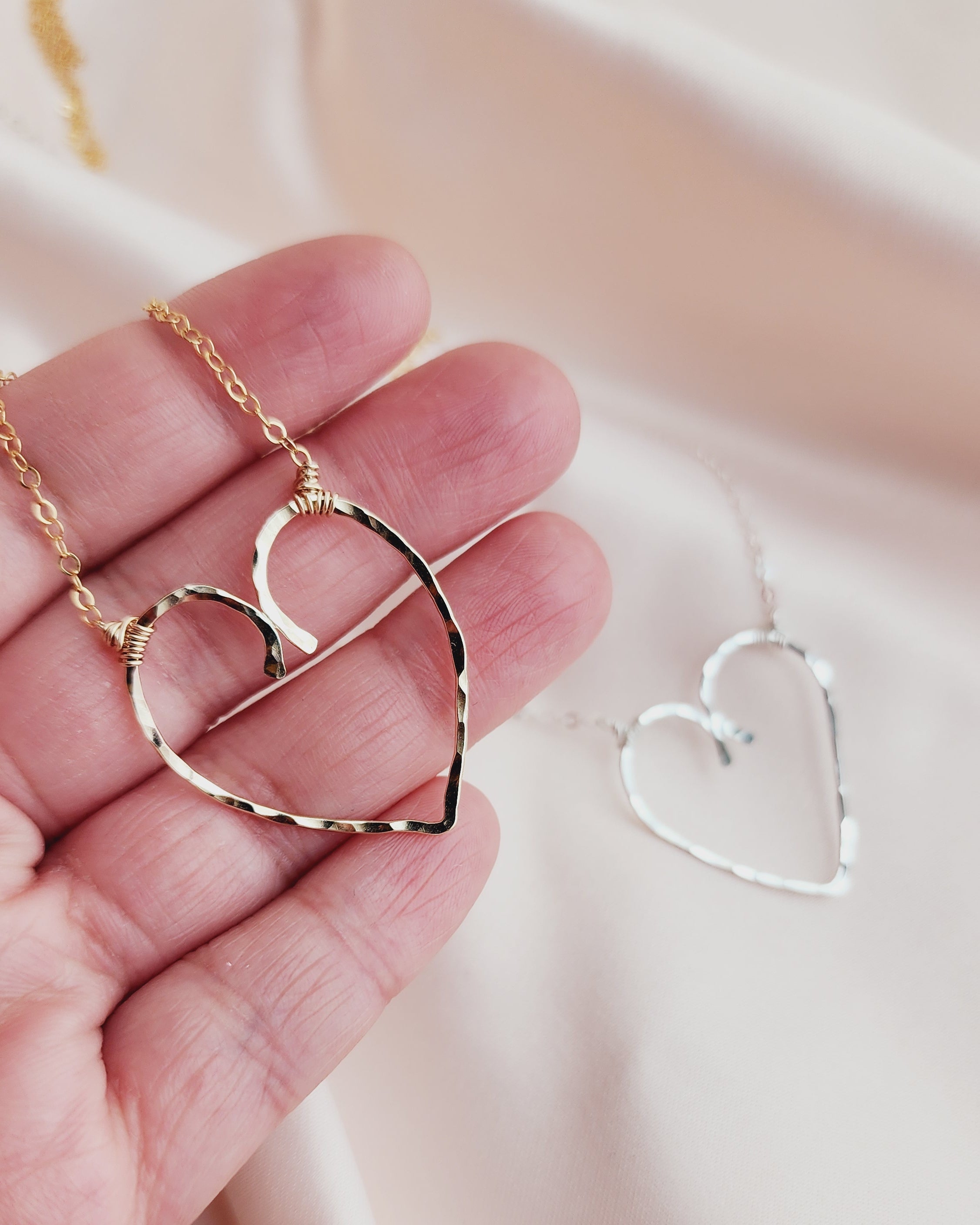 Front image- Hammer Heart Pendant necklace made of 14kt golf fill and sterling silver for everyday wear