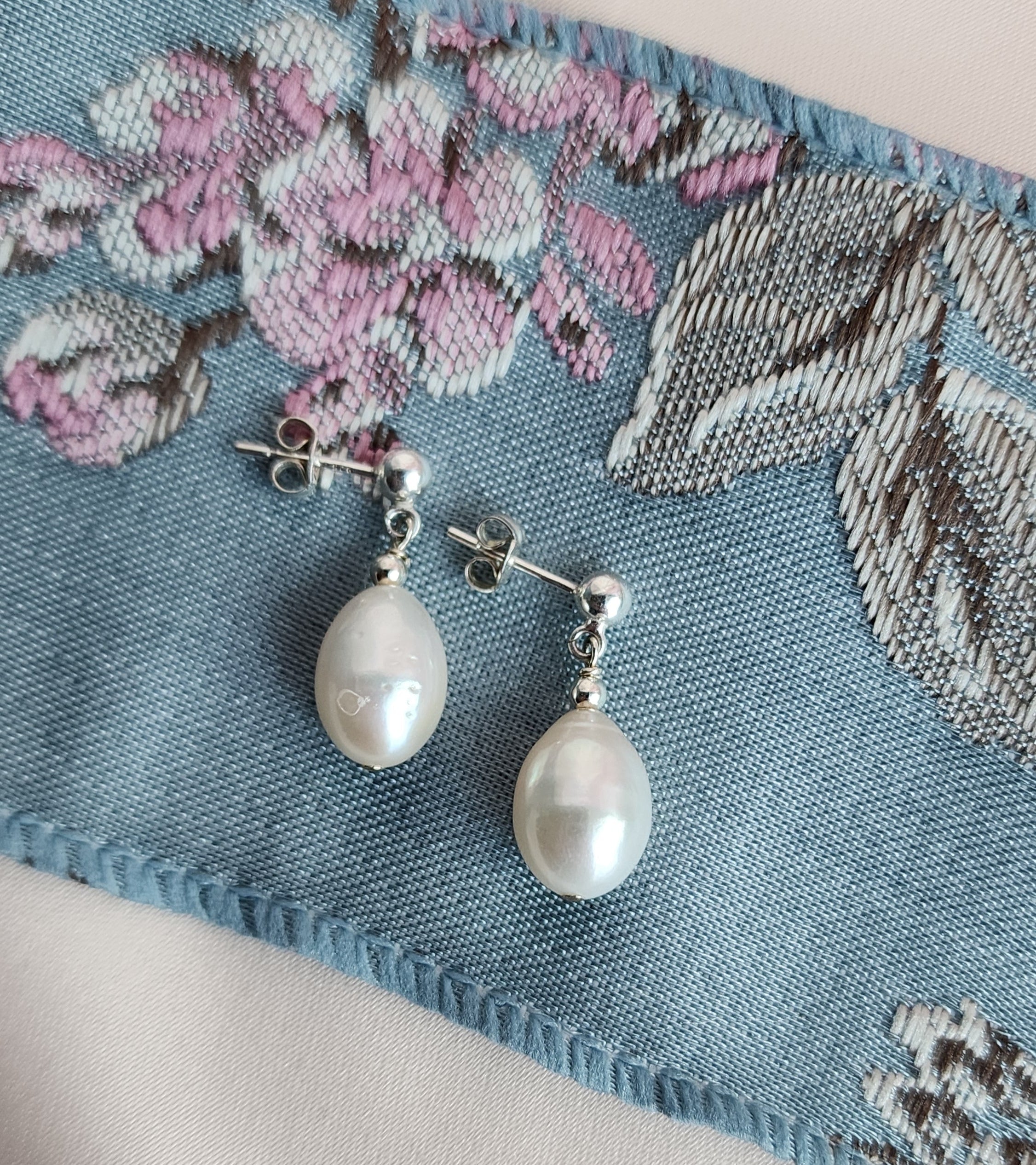 Top View Classic Pearl Stud Earrings with 10mm pearls for the perfect petite but eye stopping earrings for everyday and brides to wear