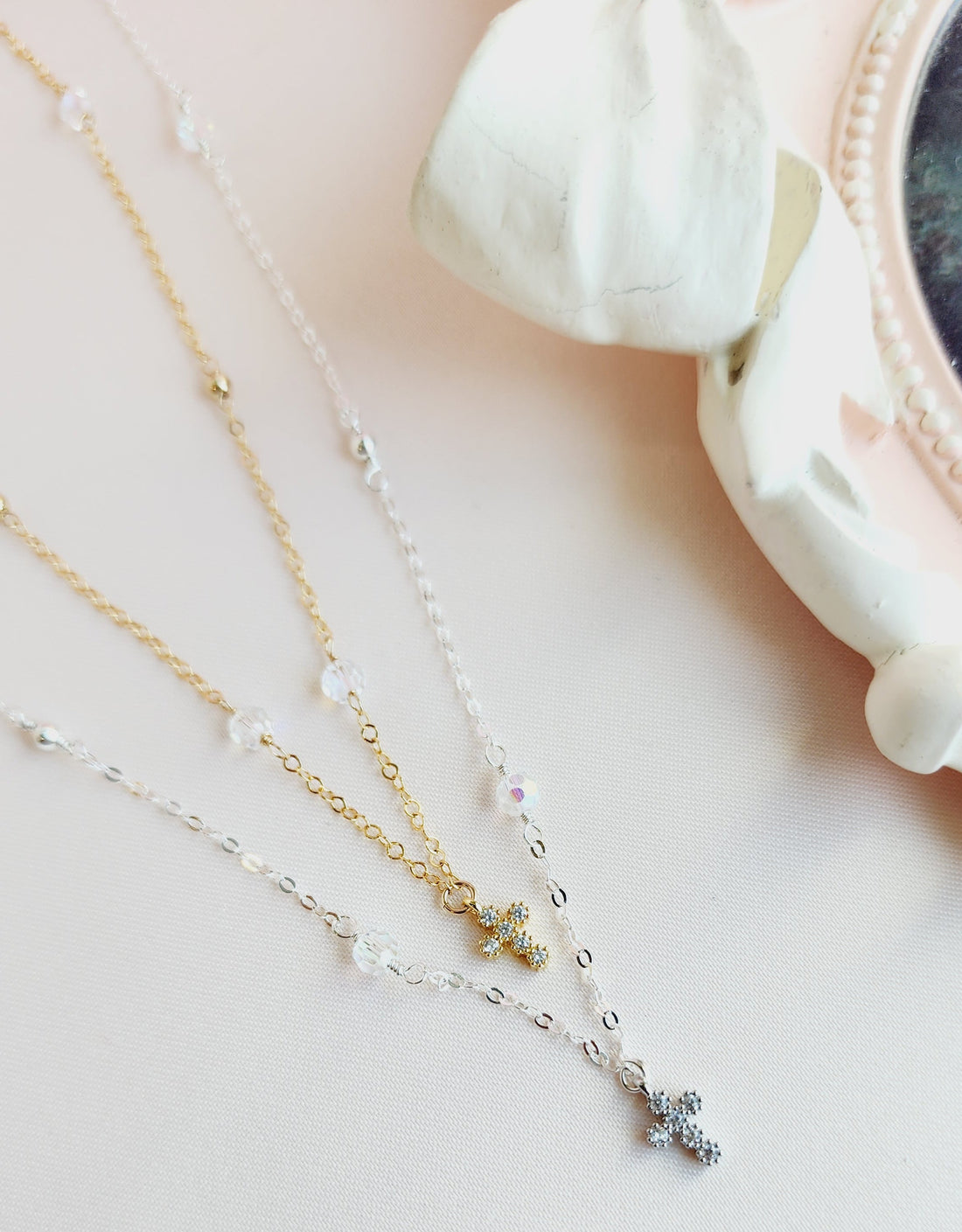 Iridescent, romantic dainty necklace with eye capturing cross