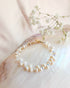 Top View Of a beaded pearl and ab iridescent crystal bracelet