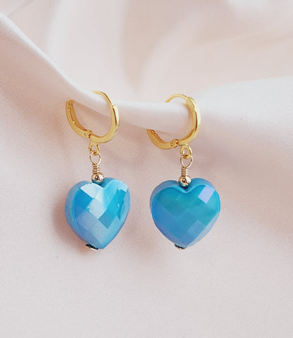 Front view baby blue faceted heart earrings hoops