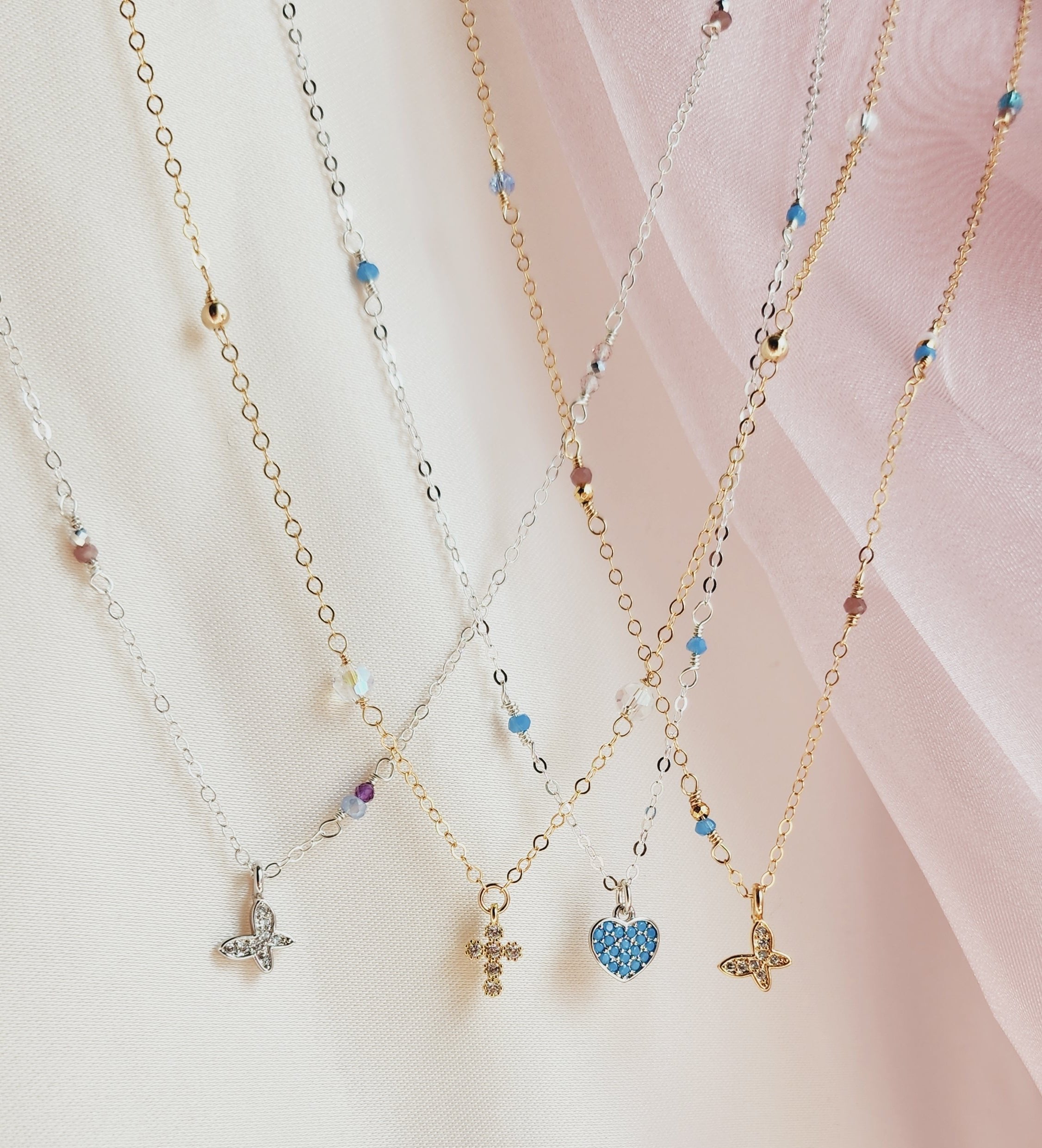 Handcrafted dainty everyday necklaces with asymmetrical hand-beaded 14k gold fill chains, perfect for whimsical, ethereal bridal or daily wear.