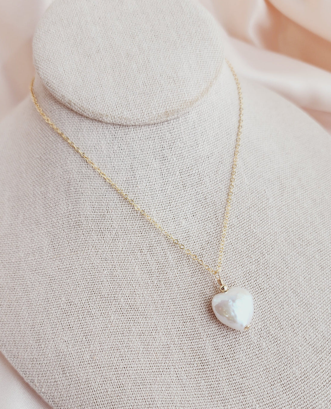 dainty freshwater pearl heart necklace for everyday wear that captures a romantic feel when worn