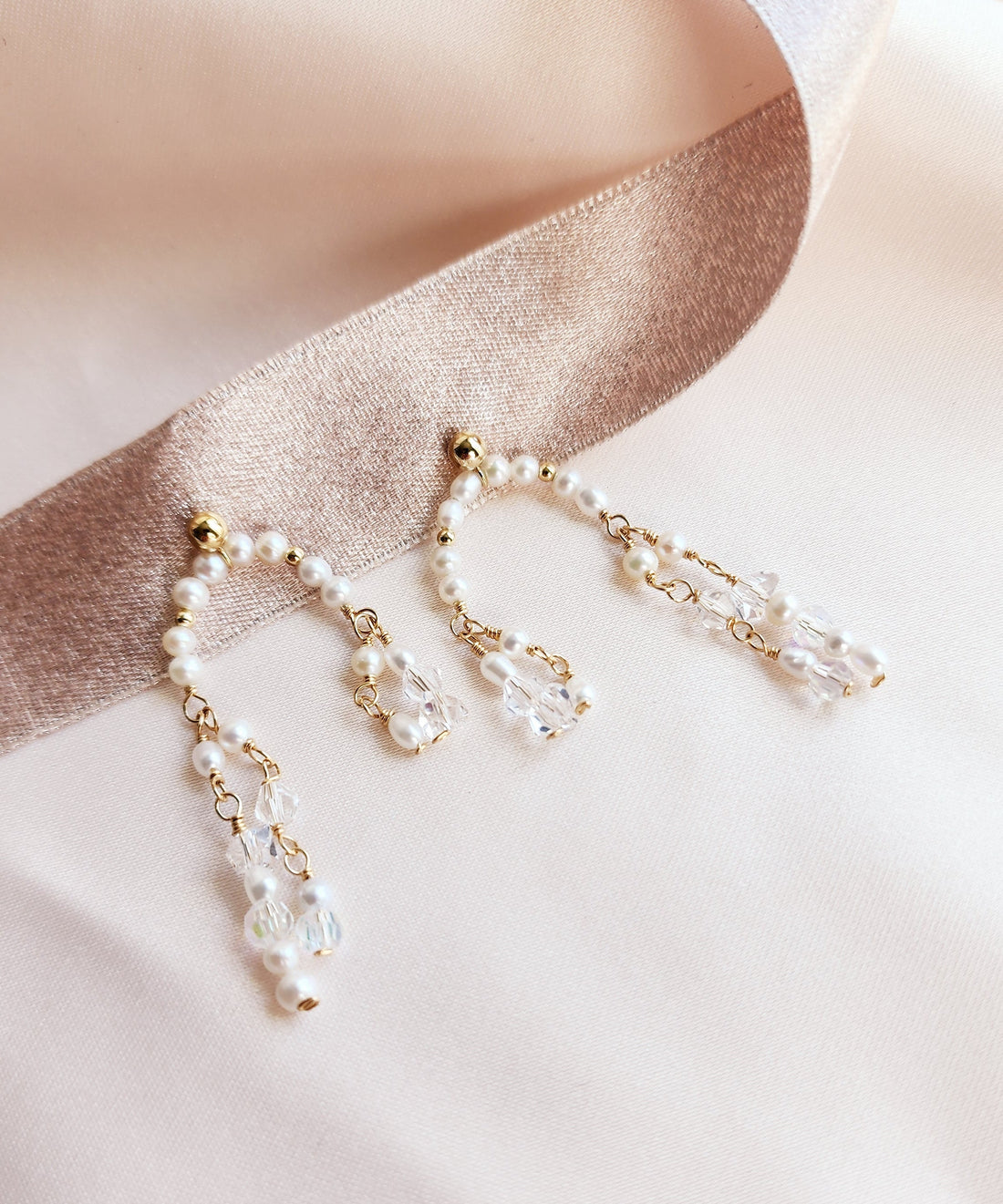 Top view whimsical pearl and crystal earrings