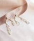 Top view whimsical pearl and crystal earrings