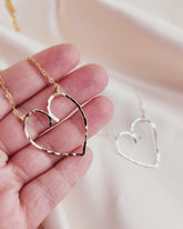 Front image- Hammer Heart Pendant necklace made of 14kt golf fill and sterling silver for everyday wear