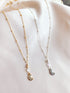 Crescent moon necklace made out of 14kt gold fill and sterling silver statellite chain
