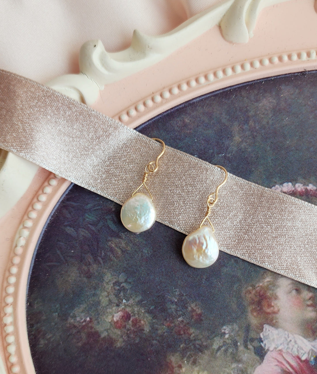 Front View peach color pearl earrings with 14kt gold fill hooks for everyday wear