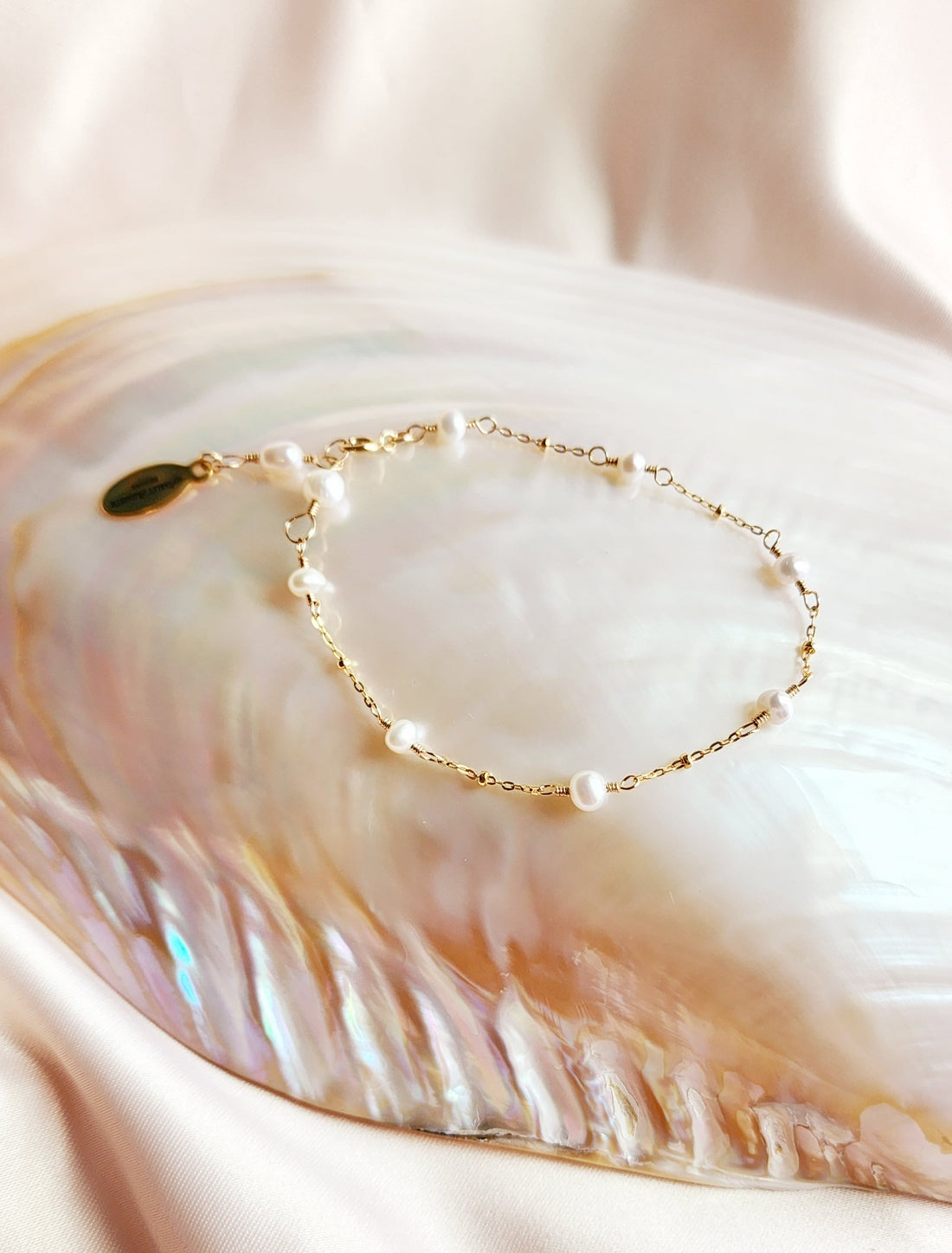 Top View hand linked freshwater pearls in a stateliite chain bracelet for a whimsical look 