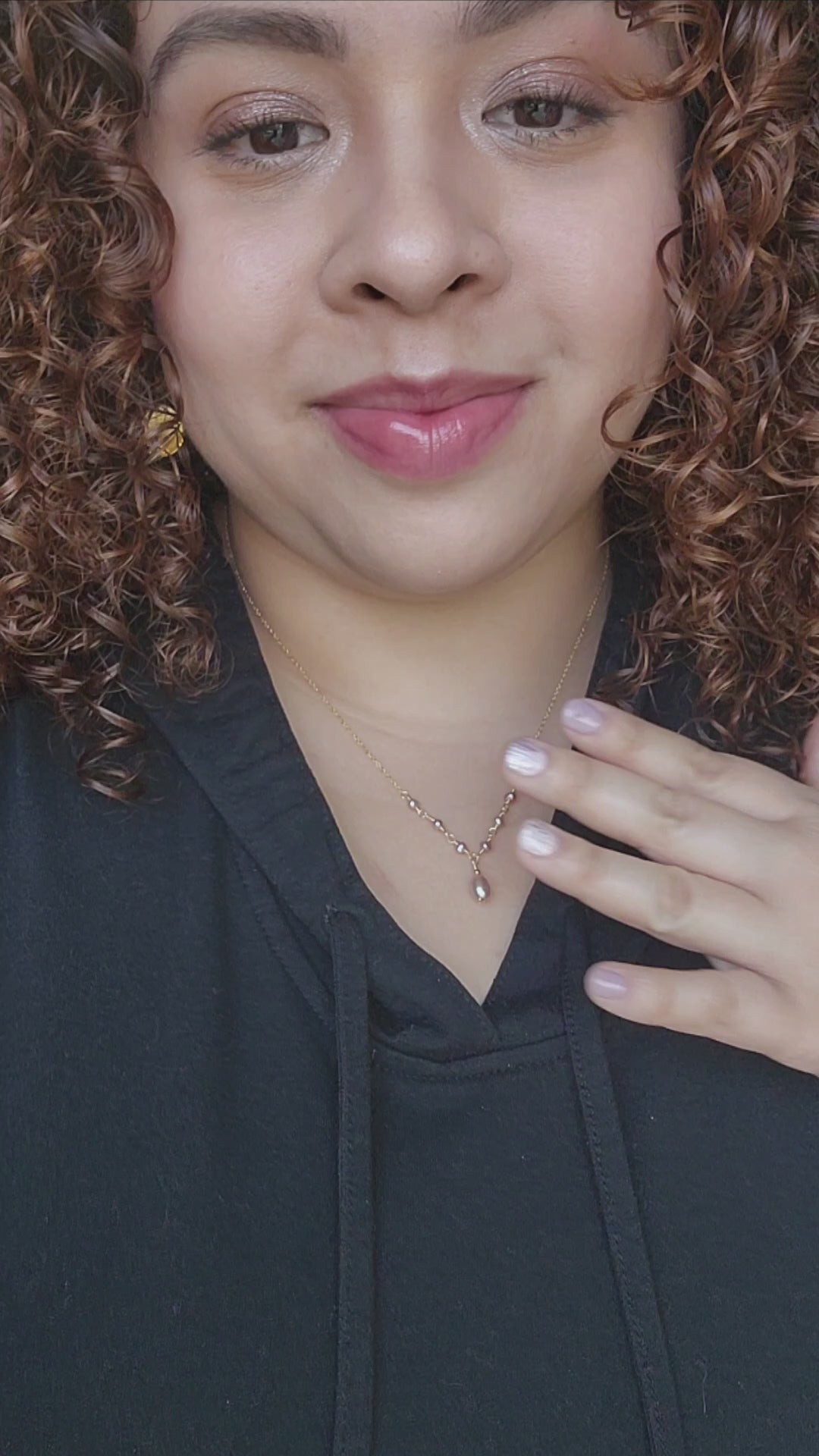 Plus size model showing how beautiful the regency pearl necklace is in lavender pearl